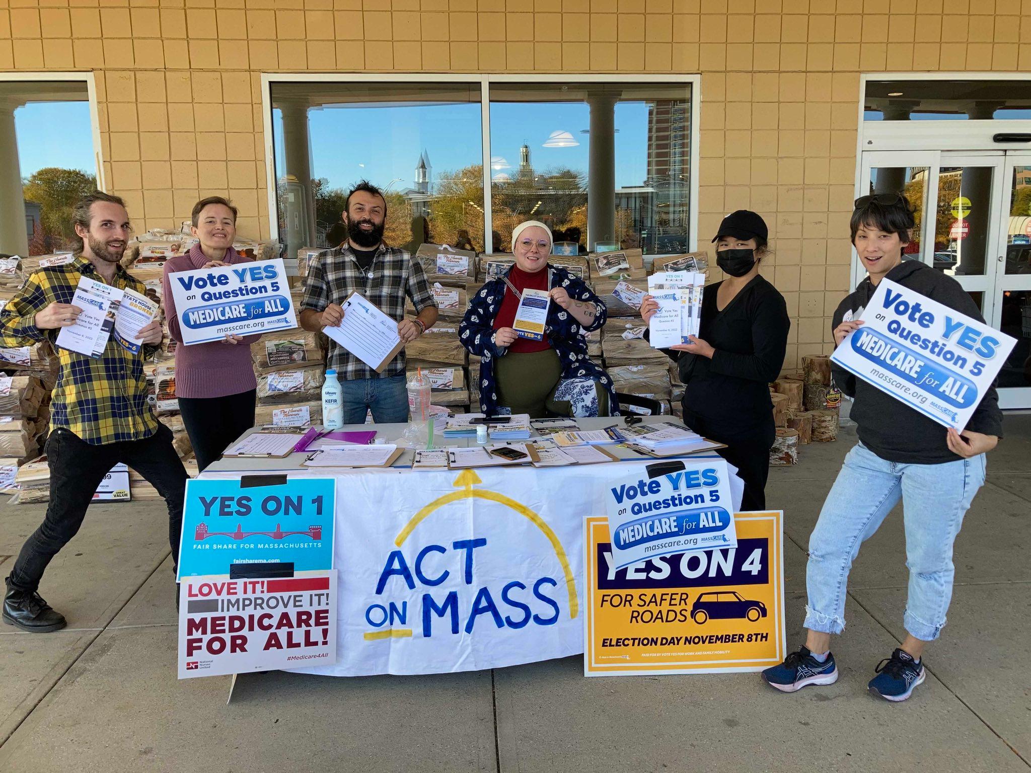 People smiling with protest signs